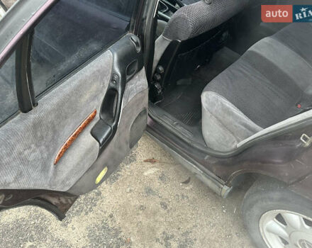 Красный Опель Омега, объемом двигателя 2.5 л и пробегом 390 тыс. км за 1800 $, фото 12 на Automoto.ua