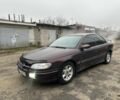 Красный Опель Омега, объемом двигателя 2.5 л и пробегом 390 тыс. км за 1800 $, фото 1 на Automoto.ua