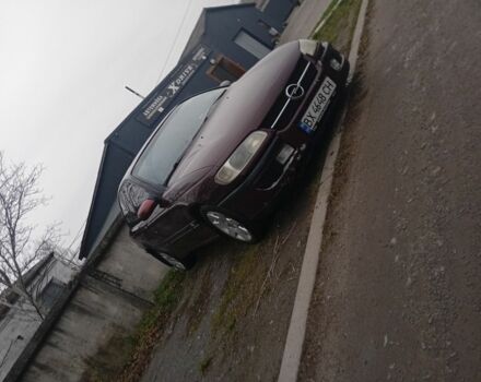 Червоний Опель Омега, об'ємом двигуна 2 л та пробігом 65 тис. км за 1550 $, фото 4 на Automoto.ua