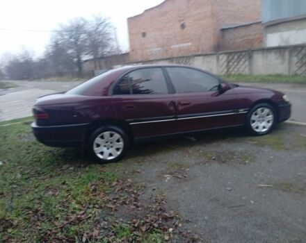 Червоний Опель Омега, об'ємом двигуна 2 л та пробігом 65 тис. км за 1550 $, фото 8 на Automoto.ua