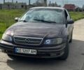 Червоний Опель Омега, об'ємом двигуна 2 л та пробігом 350 тис. км за 1700 $, фото 1 на Automoto.ua