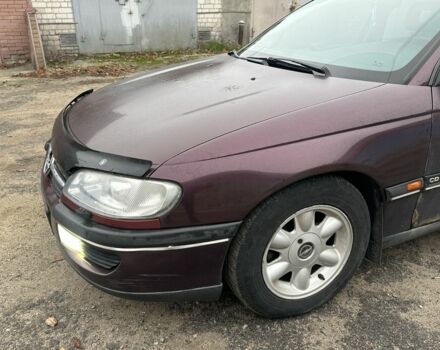 Красный Опель Омега, объемом двигателя 2.5 л и пробегом 390 тыс. км за 1800 $, фото 7 на Automoto.ua