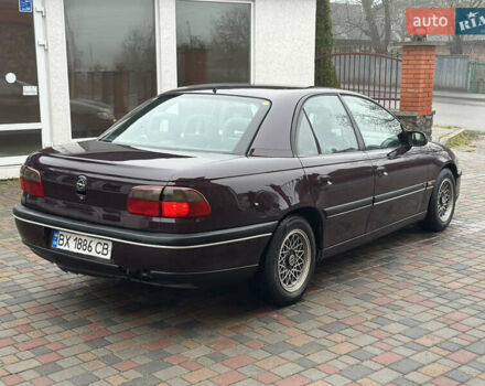 Красный Опель Омега, объемом двигателя 2 л и пробегом 301 тыс. км за 2250 $, фото 9 на Automoto.ua