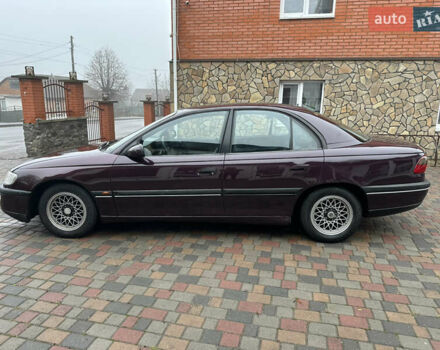 Красный Опель Омега, объемом двигателя 2 л и пробегом 301 тыс. км за 2200 $, фото 7 на Automoto.ua