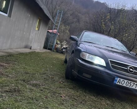 Красный Опель Омега, объемом двигателя 2 л и пробегом 330 тыс. км за 1900 $, фото 3 на Automoto.ua