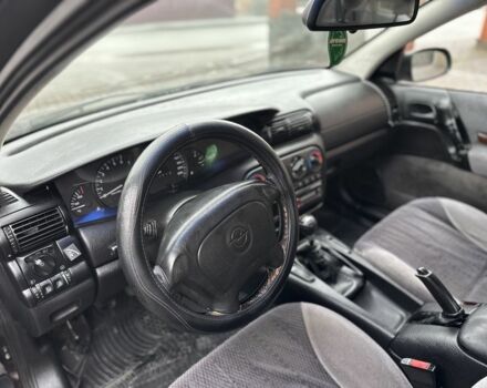 Червоний Опель Омега, об'ємом двигуна 2 л та пробігом 301 тис. км за 2200 $, фото 9 на Automoto.ua