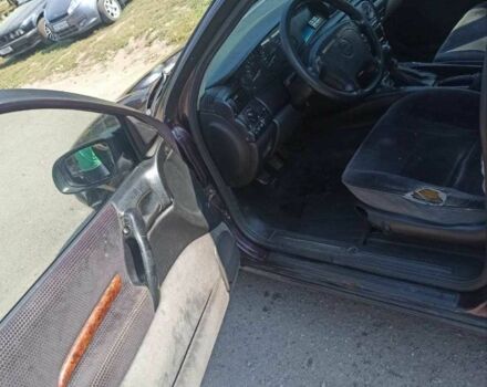 Червоний Опель Омега, об'ємом двигуна 2 л та пробігом 534 тис. км за 1200 $, фото 5 на Automoto.ua