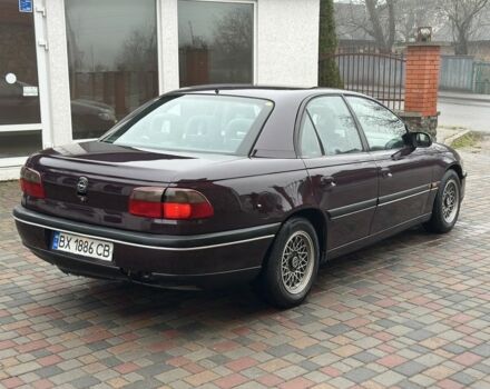 Червоний Опель Омега, об'ємом двигуна 2 л та пробігом 301 тис. км за 2200 $, фото 7 на Automoto.ua