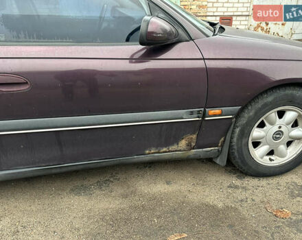 Красный Опель Омега, объемом двигателя 2.5 л и пробегом 390 тыс. км за 1800 $, фото 5 на Automoto.ua