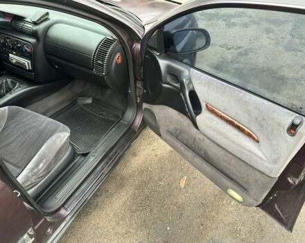 Красный Опель Омега, объемом двигателя 2.5 л и пробегом 390 тыс. км за 1800 $, фото 18 на Automoto.ua