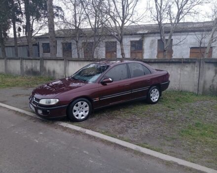 Червоний Опель Омега, об'ємом двигуна 2 л та пробігом 65 тис. км за 1550 $, фото 3 на Automoto.ua