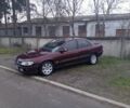 Червоний Опель Омега, об'ємом двигуна 2 л та пробігом 65 тис. км за 1550 $, фото 3 на Automoto.ua