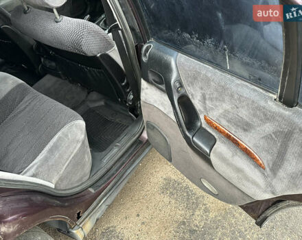 Красный Опель Омега, объемом двигателя 2.5 л и пробегом 390 тыс. км за 1800 $, фото 16 на Automoto.ua