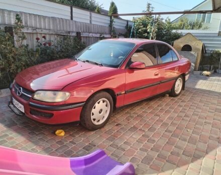 Красный Опель Омега, объемом двигателя 2 л и пробегом 250 тыс. км за 2400 $, фото 6 на Automoto.ua