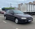 Красный Опель Омега, объемом двигателя 2 л и пробегом 280 тыс. км за 2400 $, фото 1 на Automoto.ua