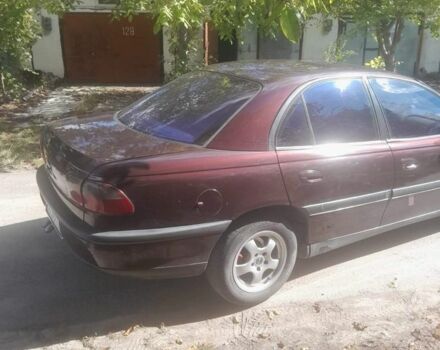 Красный Опель Омега, объемом двигателя 2 л и пробегом 140 тыс. км за 2500 $, фото 3 на Automoto.ua