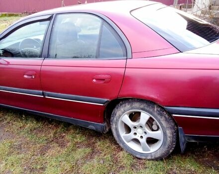 Красный Опель Омега, объемом двигателя 2 л и пробегом 290 тыс. км за 1700 $, фото 3 на Automoto.ua