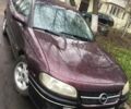 Красный Опель Омега, объемом двигателя 2 л и пробегом 260 тыс. км за 500 $, фото 1 на Automoto.ua