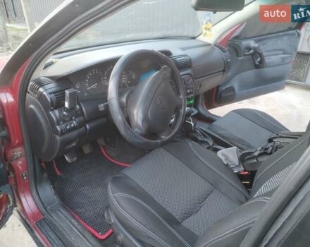 Червоний Опель Омега, об'ємом двигуна 1.8 л та пробігом 398 тис. км за 2500 $, фото 8 на Automoto.ua
