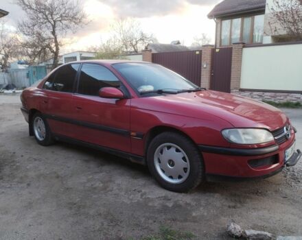 Красный Опель Омега, объемом двигателя 2 л и пробегом 250 тыс. км за 2400 $, фото 2 на Automoto.ua