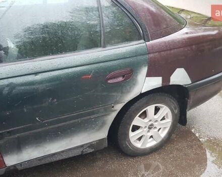 Красный Опель Омега, объемом двигателя 2 л и пробегом 300 тыс. км за 2700 $, фото 6 на Automoto.ua