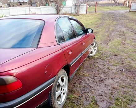 Красный Опель Омега, объемом двигателя 2 л и пробегом 290 тыс. км за 1700 $, фото 1 на Automoto.ua