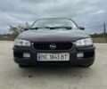Красный Опель Омега, объемом двигателя 2.5 л и пробегом 313 тыс. км за 1500 $, фото 1 на Automoto.ua