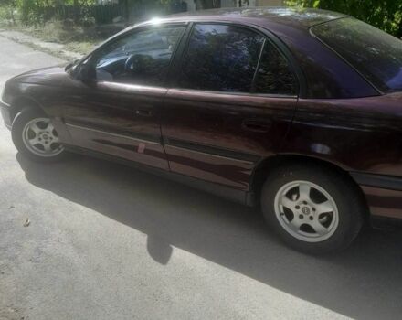 Красный Опель Омега, объемом двигателя 2 л и пробегом 140 тыс. км за 2500 $, фото 1 на Automoto.ua