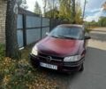 Красный Опель Омега, объемом двигателя 2 л и пробегом 490 тыс. км за 1500 $, фото 1 на Automoto.ua