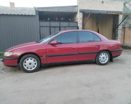 Красный Опель Омега, объемом двигателя 2 л и пробегом 250 тыс. км за 2400 $, фото 3 на Automoto.ua