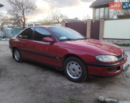 Червоний Опель Омега, об'ємом двигуна 1.8 л та пробігом 398 тис. км за 2500 $, фото 7 на Automoto.ua