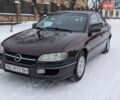 Червоний Опель Омега, об'ємом двигуна 2 л та пробігом 249 тис. км за 1999 $, фото 1 на Automoto.ua