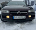 Червоний Опель Омега, об'ємом двигуна 2 л та пробігом 321 тис. км за 1999 $, фото 2 на Automoto.ua