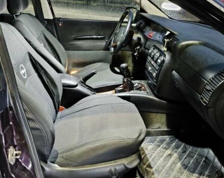 Опель Омега 1995 в Виннице на Automoto.ua Красный Опель Омега, объемом двигателя 2.5 л и пробегом 250 тыс. км за 1600 $, фото 7 на Automoto.ua