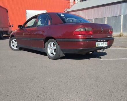 Опель Омега 1996 в Одессе на Automoto.ua Красный Опель Омега, объемом двигателя 2.5 л и пробегом 316 тыс. км за 2500 $, фото 2 на Automoto.ua