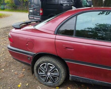 Червоний Опель Омега, об'ємом двигуна 2 л та пробігом 300 тис. км за 2200 $, фото 4 на Automoto.ua