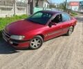 Красный Опель Омега, объемом двигателя 2.5 л и пробегом 300 тыс. км за 1500 $, фото 1 на Automoto.ua