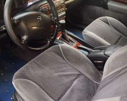 Опель Омега 1996 в Одессе на Automoto.ua Красный Опель Омега, объемом двигателя 2.5 л и пробегом 316 тыс. км за 2500 $, фото 4 на Automoto.ua