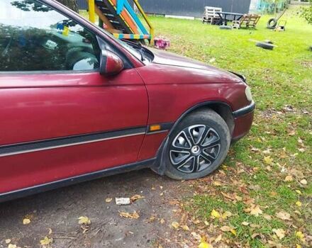 Червоний Опель Омега, об'ємом двигуна 2 л та пробігом 300 тис. км за 2200 $, фото 5 на Automoto.ua