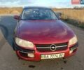 Красный Опель Омега, объемом двигателя 2 л и пробегом 280 тыс. км за 2000 $, фото 1 на Automoto.ua