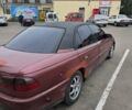 Червоний Опель Омега, об'ємом двигуна 2 л та пробігом 335 тис. км за 1750 $, фото 7 на Automoto.ua