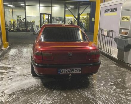 Опель Омега 1996 в Новомосковске на Automoto.ua Красный Опель Омега, объемом двигателя 2 л и пробегом 400 тыс. км за 1600 $, фото 2 на Automoto.ua