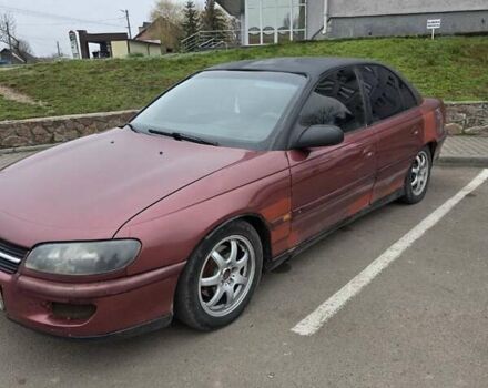 Червоний Опель Омега, об'ємом двигуна 2 л та пробігом 335 тис. км за 1750 $, фото 5 на Automoto.ua