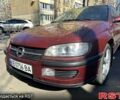 Червоний Опель Омега, об'ємом двигуна 2 л та пробігом 400 тис. км за 1550 $, фото 1 на Automoto.ua