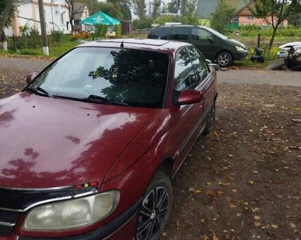 Червоний Опель Омега, об'ємом двигуна 2 л та пробігом 300 тис. км за 2200 $, фото 1 на Automoto.ua