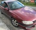 Червоний Опель Омега, об'ємом двигуна 2.5 л та пробігом 220 тис. км за 1500 $, фото 1 на Automoto.ua