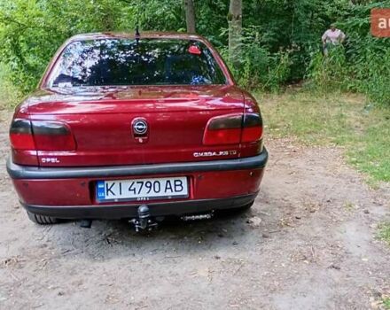 Красный Опель Омега, объемом двигателя 2.5 л и пробегом 352 тыс. км за 3300 $, фото 7 на Automoto.ua