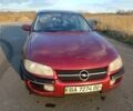 Красный Опель Омега, объемом двигателя 2 л и пробегом 280 тыс. км за 2000 $, фото 1 на Automoto.ua