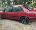 Червоний Опель Омега, об'ємом двигуна 2 л та пробігом 294 тис. км за 1550 $, фото 3 на Automoto.ua