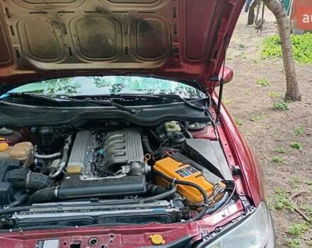 Красный Опель Омега, объемом двигателя 2.5 л и пробегом 352 тыс. км за 3300 $, фото 5 на Automoto.ua